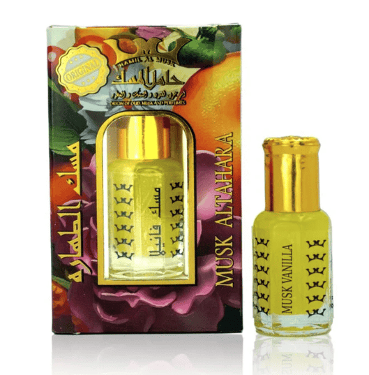 A bottle of Musk Vanilla perfume oil next to its packaging box