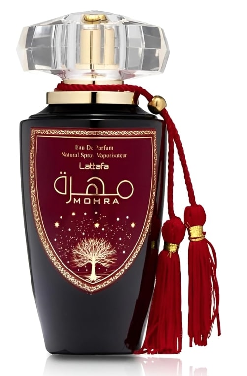 Perfume bottle with red tassels on a white background
