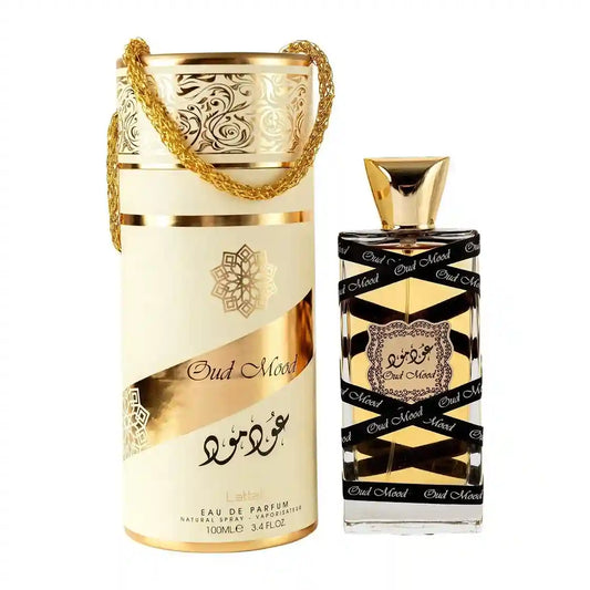 Oud Mood perfume, Lattafa Oud Mood, amber and spice fragrance, oriental oud perfume, long-lasting Arabic perfume, luxury fragrance for men and women, musk and incense scent, rich oud-based perfume, elegant and bold scent, woody and spicy fragrance.
